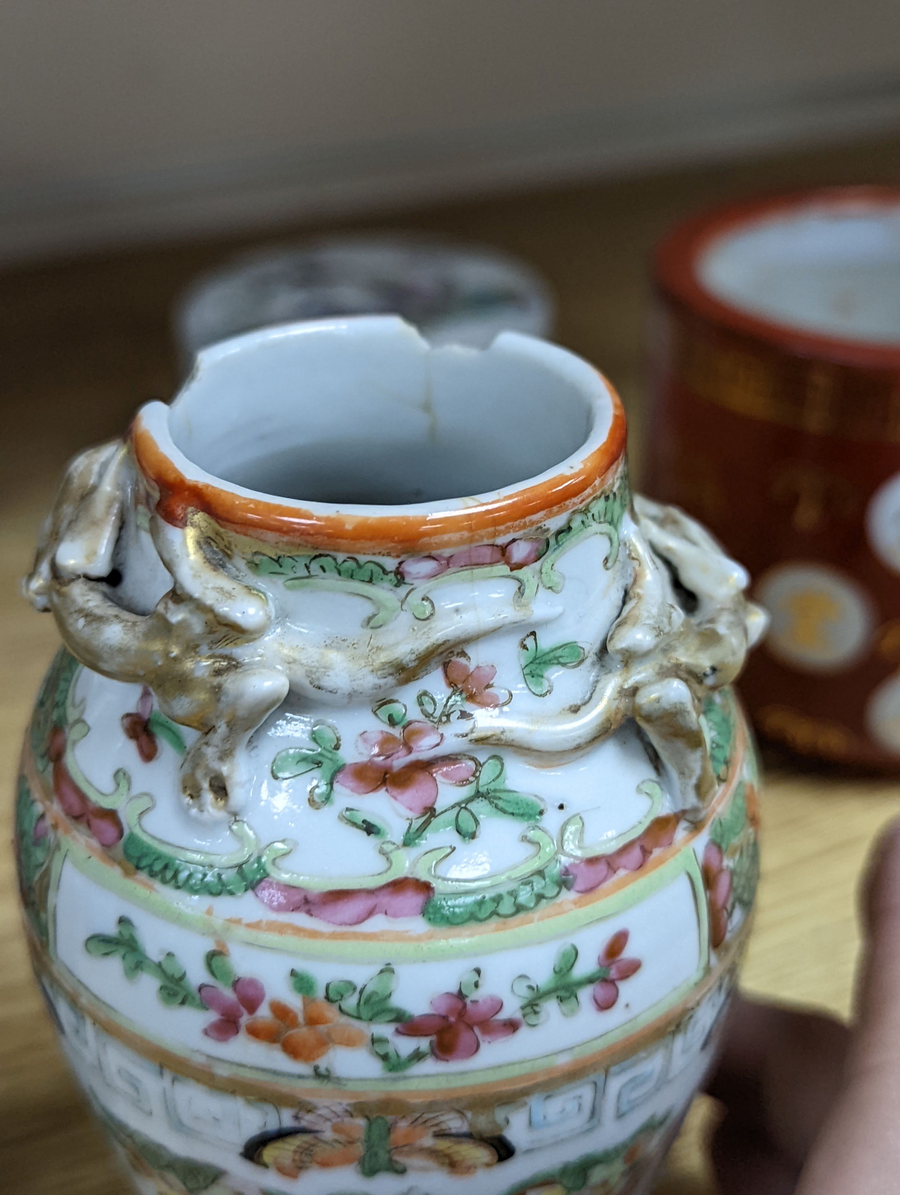 A group of Chinese famille rose vases and jars, a box and cover and a teapot, 19th/20th century, Pair of vases 13 cms high.